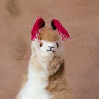 LLA-038 Large Soft and Fluffy Brown and White Alpaca with magenta ear tassels