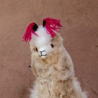 LLA-039 Large Soft and Fluffy Tan Alpaca with magenta ear tassels